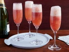 Frame 1041
Bobby Flay's Grand Champagne Cocktail is made of orange-flavored liqueur, honey and strawberries. ,Frame 1041
Bobby Flay's Grand Champagne Cocktail is made of orange-flavored liqueur, honey and strawberries. 