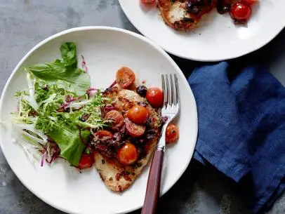 PAN SEARED CHICKEN WITH OLIVES
Geoffrey Zakarian
The Kitchen/The Kitchen Helpline
Food Network
Chicken Breasts, Olive Oil, Flatleaf
Parsley, Shallots, Garlic, Cherry Tomatoes, Basil, Kalamata
Olives, Sherry Vinegar, Chicken Broth, Dijon Mustard