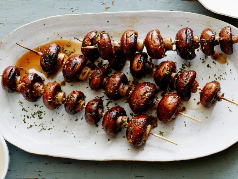 GRILLED MUSHROOM SKEWERS
Food Network Kitchen
Unsalted Butter, Garlic, Soy Sauce, Cremini Mushrooms, Thyme