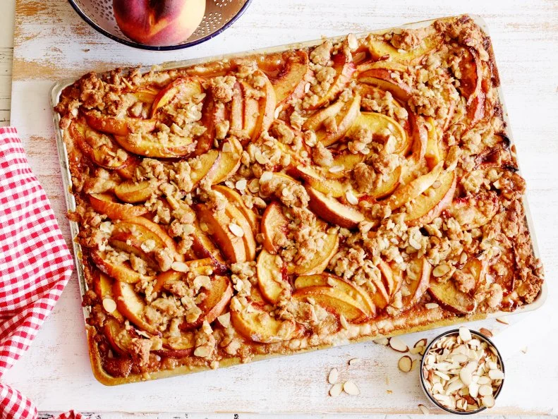 FNK PEACH STREUSEL SLAB PIE, Food Network Kitchen, Allpurpose
Flour,
Unsalted Butter, Confectioners’ Sugar, Peaches, Light Brown Sugar, Lemon,
Cornstarch, Vanilla Extract, Cinnamon, Nutmeg, Almonds