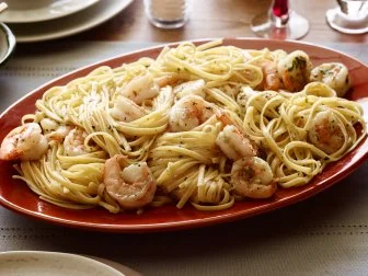SHRIMP SCAMPI WITH LINGUINI
Tyler Florence
Cooking Channel
Linguini, Butter, Olive Oil, Shallots, Garlic, Red Pepper Flakes, Shrimp, Kosher Salt, Dry
White Wine, Lemon, Parsley