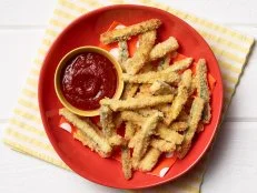 Food Network Kitchen’s Baked Parmesan Zucchini Fries for Summer Slow Cooker/Zucchini Fries/Picnic Brick-Pressed Sandwiches, as seen on Food Network.