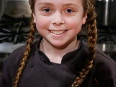Junior chef Cassidy Tryon poses, as seen on Chopped Junior, Season 7.