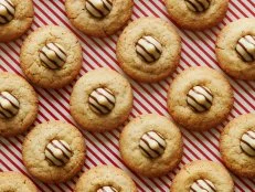 Sugar, Heavy Cream, Rum Extract, Ground Cloves, Egg, Foil Wrapped Striped Milk chocolate - White Chocolate Drops
