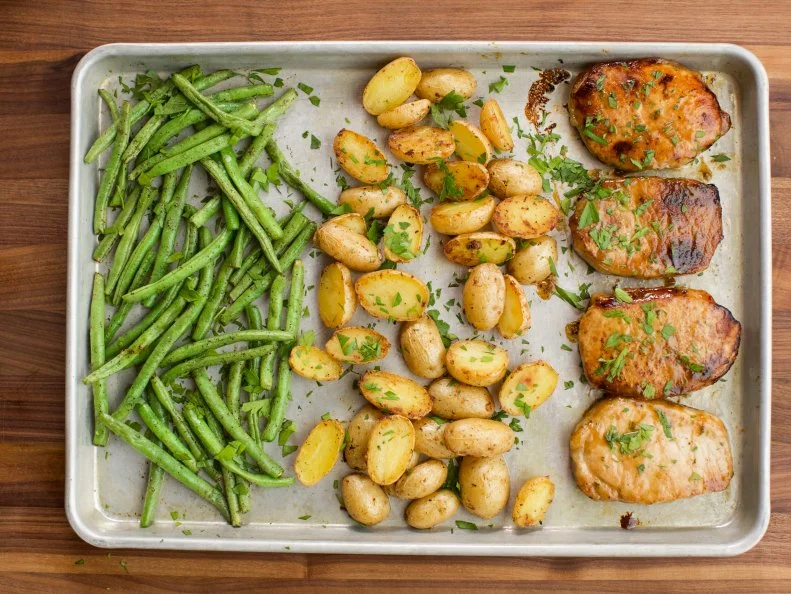 Close-up of Ranch Pork Chop Sheet Pan Dinner, as seen on The Pioneer Woman, Season 19.