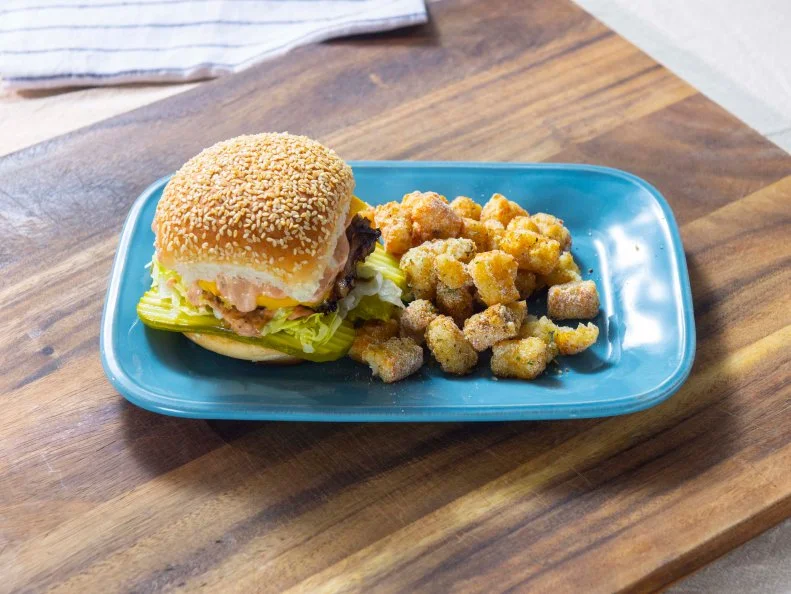 Host Rachel Ray's Oklahoma Style S’mack Burgers and Ranch Flavored Tater Tots, as seen on 30 Minute Meals, Season 28.