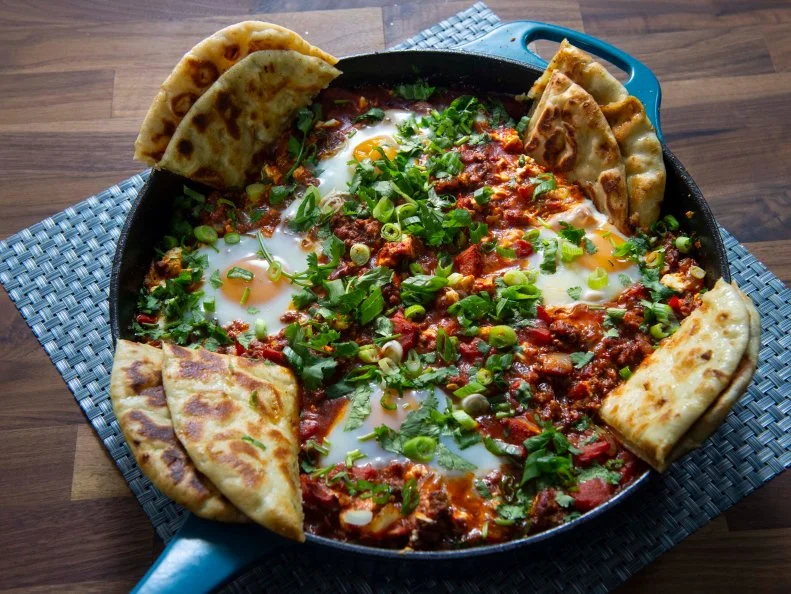 Host Rachel Ray's Lamb Shakshouka, as seen on 30 Minute Meals, Season 28.