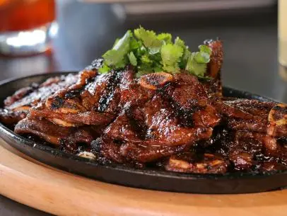 The Korean Style Beef Short Ribs as Served at OB Noodle House's New Location Bar 1502 in San Diego, California, as seen on DDD Nation, Special.
