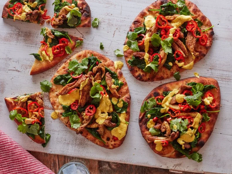 Food Network Kitchen’s Turmeric Chicken Naan Flatbread.