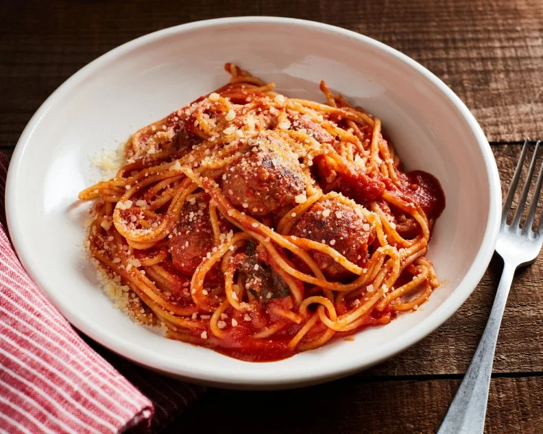 Food Network Kitchen’s 20-Minute Instant Pot Spaghetti with Sausage Meatballs.