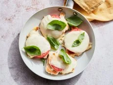 Description: Food Network Kitchen's Caprese Chicken Breasts Pan-Fried from Frozen. Keywords: Chicken Breasts, Black Pepper, Salt, Beefsteak Tomato, Mozzarella, Basil