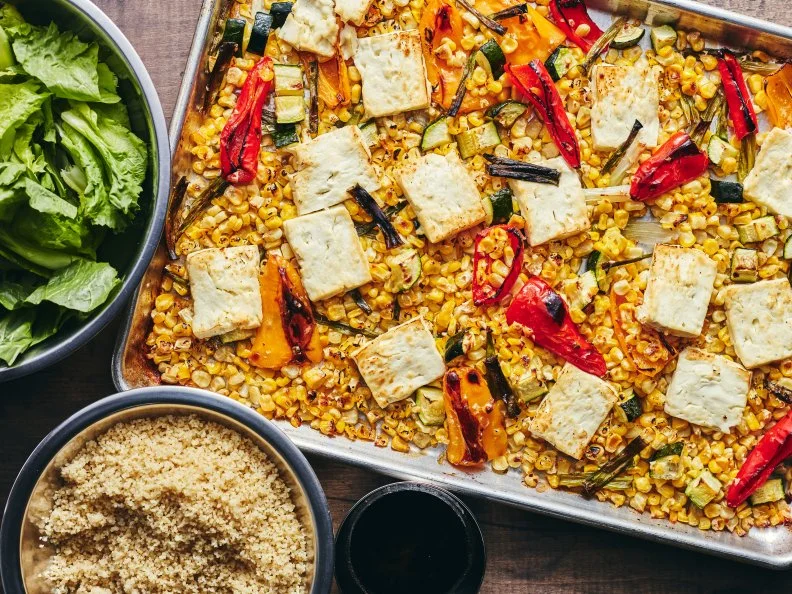 Description: Food Network Kitchen's Sheet Pan Baked Feta with Summer Vegetables.
