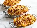 Description: Ina Garten's Lobster Mac and Cheese. Keywords: Cavatappi, Elbow Macaroni, Milk, Gruyere Cheese, Cheddar, Nutmeg, Lobster, White Bread.