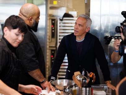 Host Geoffrey Zakarian, with Contestant Demetrius Baxter as seen on Big Restaurant Bet, Season 1.