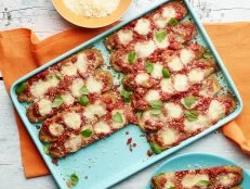 Food Network Kitchen’s Sheet Pan Zucchini Parmesan as seen on Food Network.