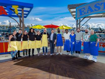 Host Antonia Lofaso with Mentor Brian Malarkey with his Team "West Coast" ft. Contestants Amanda Smith, Cesar Oceguera, Jasmyne Romero-Clark, David Lespron and Emily Lim and Mentor Eric Adjepong with his Team "East Coast" ft. Contestants Nick Chavez, Samantha Cruz, Martel Stone, Cara Nance and Wesley Nogueira, as seen on Beachside Brawl, Season 2.