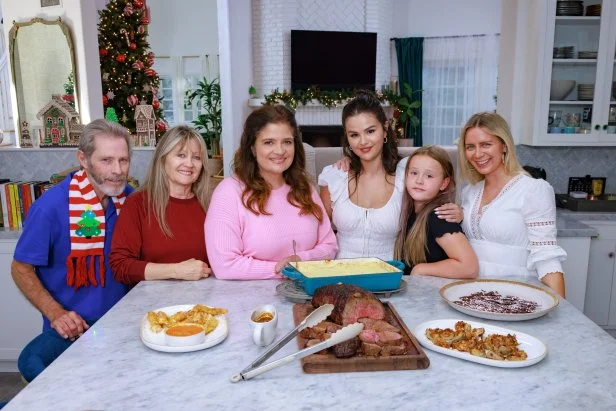 Chef Alex Guarnaschelli, Host Selena Gomez and family, as seen on Selena + Chef: Home for the Holidays, Season 1.