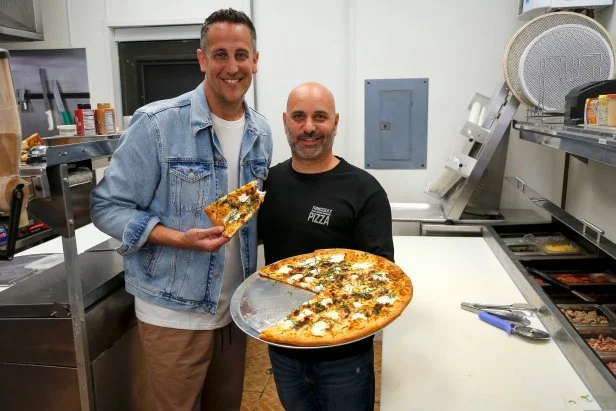 Noah Cappe with chef-owner John Fuoco tasting the Blakely Pizza at Francesca's Pizza in Port St. Lucie, FL, as seen on Food Network's Best Bite in Town; Pilot episode.