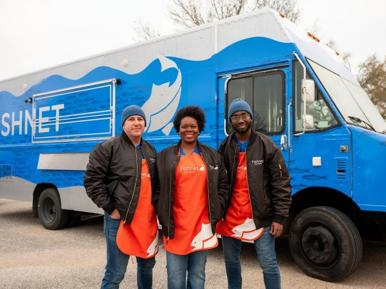 FISH NET’s team members, Ferhat Yalcin, Uswa McDowell and Keyia Yalcin, as seen on The Great Food Truck Race, Season 17.