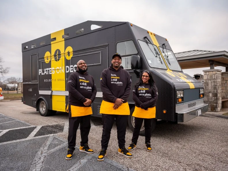 PLATES ON DECK’s team members, Ken James, Ziomara Taveras and Samuel Jenkins, as seen on The Great Food Truck Race, Season 17.