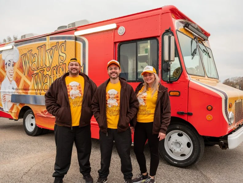 WALLY’S WAFFLES team members, Wally Strzepka, Maggie Strzepka and Joe Caiafa, as seen on The Great Food Truck Race, Season 17.
