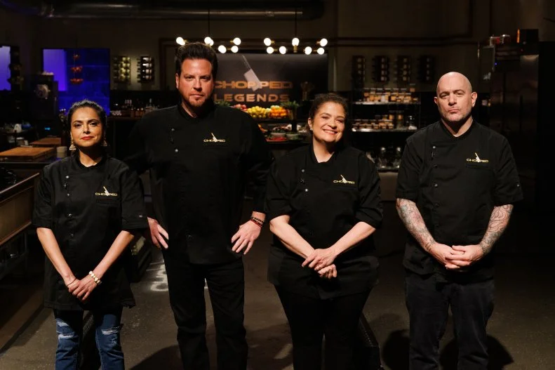 Chefs Maneet Chauhan, Scott Conant, Alex Guarnaschelli and Chris Santos pose together, as seen on Chopped: Legends, Season 59.