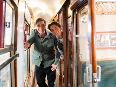Hosts Oliver and James Phelps, as seen on Harry Potter: Wizards of Baking, Season 1.