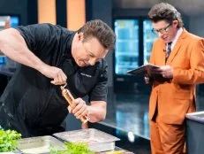 Contestant Rocco DiSpirito and Floor Commentator Justin Warner, as seen on Tournament of Champions, Season 6.