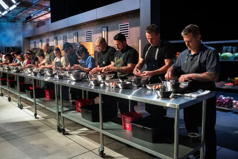 Chefs Stephanie Izard, Marc Murphy, Nini Ngyuen, Laurence Louie, Ashleigh Shanti, Lawrence “Lt” Smith Iii, Damaris Phillips, Ilan Hall, Kelsey Murphy, Gabriele Bertaccini, Bryan Voltaggio, Leslie Daniel, Michele Ragussis, Star Maye, Elia Aboumrad, Jonathon Sawyer, Sam Cruz, Kevin Lee, Dara Yu, Brittanny Anderson, Arturo Leighton, Zurisadai “Zuri” Resendiz, Kathleen O’Brien-Price, Richie Farina compete in the first challenge, as seen on 24 in 24: Last Chef Standing, Season 2.