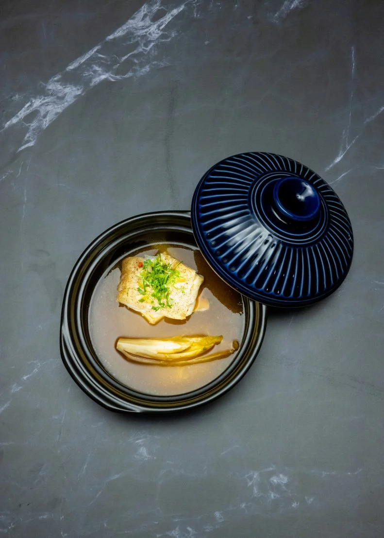 Szechuan-Style Hot & Sour Cod With Tofu and Braised Endive
