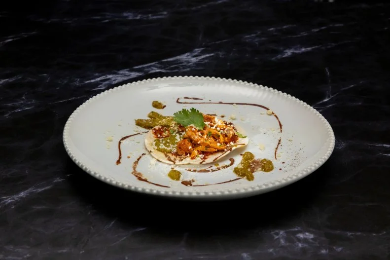 Chicken Tinga Taco With Mole, Salsa and Black Garlic Crema