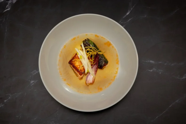 Glazed Salmon in a Pepper Broth With a Crispy Salmon & Crab Roll and Plantain Pudding