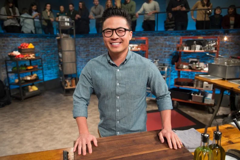 Chef Viet Pham posing on the set of Beat Bobby Flay