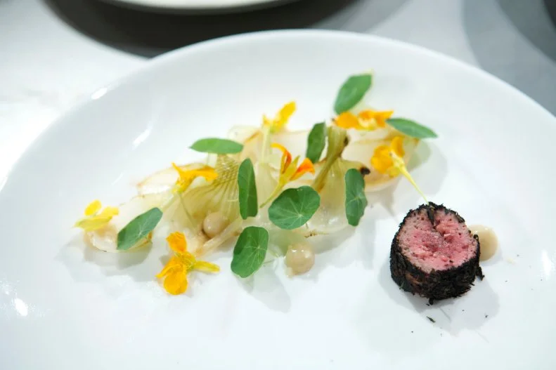 ground lamb roasted in onion ash and spring onions