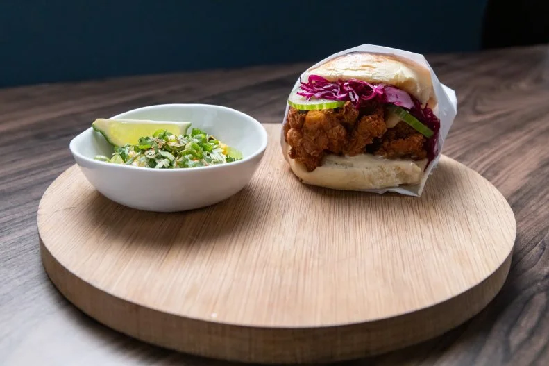 fried chicken tight and purple cabbage sandwich
