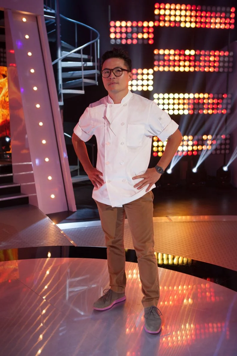 Chef Viet Pham posing on the set of Kitchen Inferno