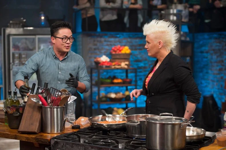 Chef Viet Pham explaining his dish to Chef Anne Burrell