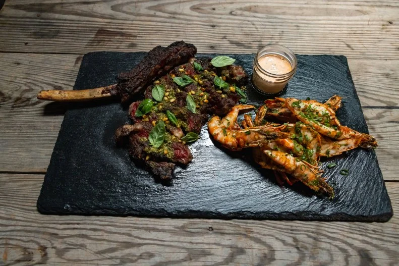 Bone-In Ribeye With Lemon Pepper Shrimp and Pesto Gremalata