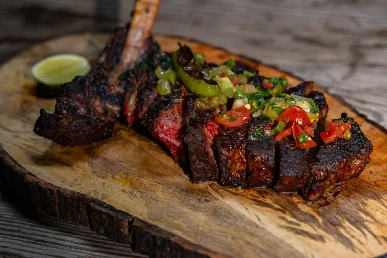 Texas-Sized Bone-In Ribeye With Chili Honey Glaze and Tomatillo Relish