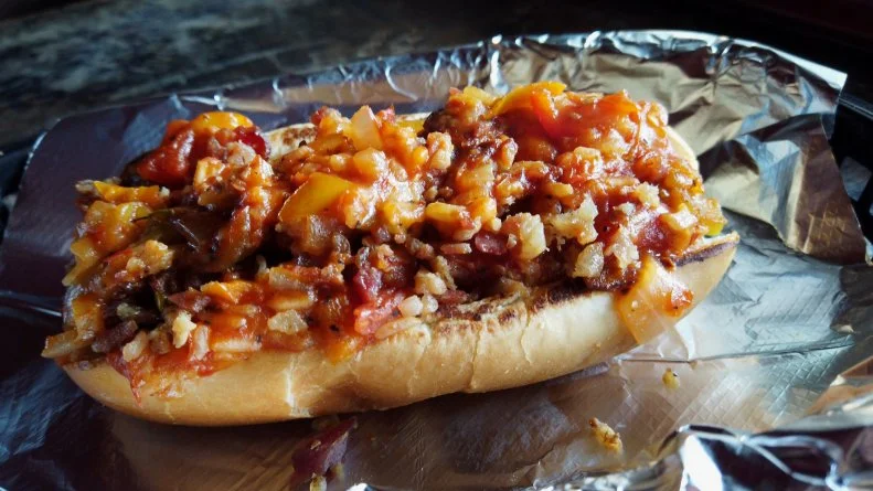 The Spank'n Bacon Hillbilly Harlot Hotdog as Served at Hillbilly Hot Dogs in Lesage, West Virginia as seen on Diners, Drive-Ins and Dives: Take Out, season 32.