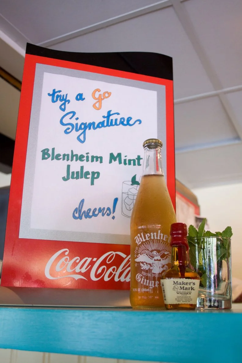 The Blenheim Julep at The Glass Onion blends Makers Mark with Lemon, Mint & Spicy Blenheim Ginger Ale for a satisfying cocktail as seen on Cooking Channel's Roadtrip with G. Garvin.