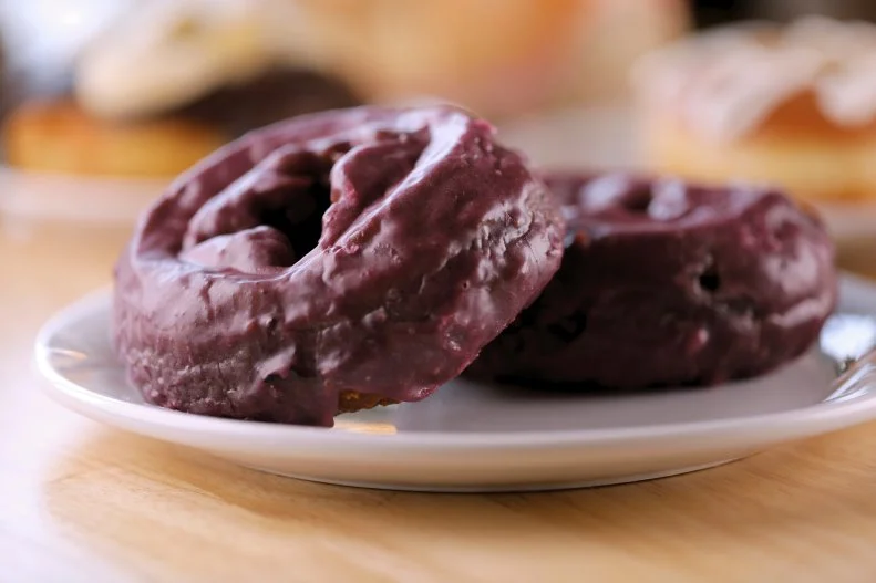 Blueberry Basil Old Fashioned Donut as prepared by Chef/Owner Haniah Sweeney at Veera Donuts in Missoula, Montana, as seen on Food Network's Diners Drive-Ins and Dives, season 40.