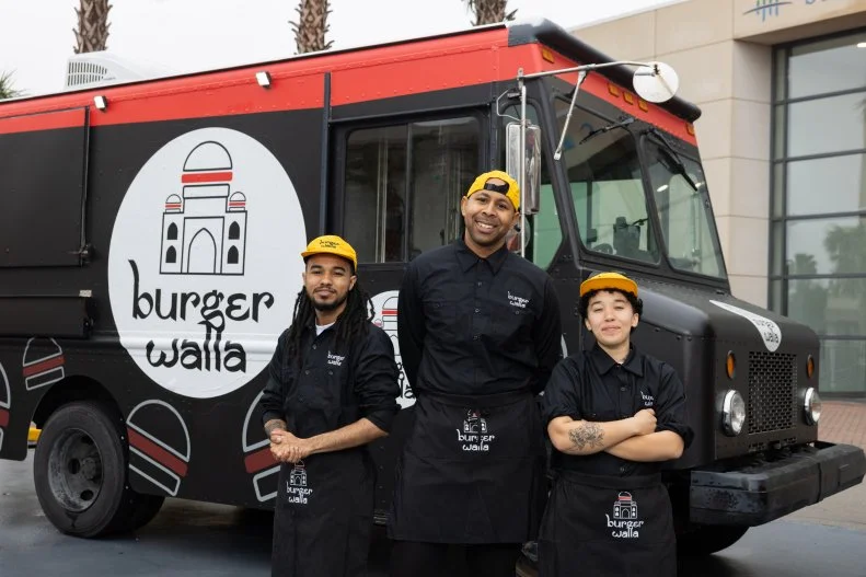 Burger Walla team members in front of their food truck