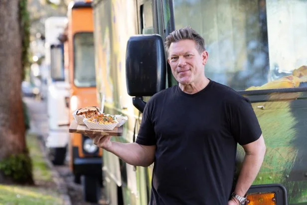 The Great Food Truck Race host Tyler Florence with food platter