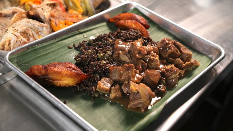 The Goat Guisade as served at Riddim N Spice in Nashville, Tennessee, as seen on Food Network's Diners, Drive-Ins and Dives: episode 3414H.